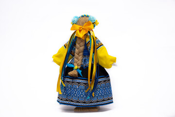 The Ukrainian motanka doll is an ancient amulet and symbol of Ukrainian culture, made without a face so as not to instill a soul in it. Instead of a face, a cross is often dangled to protect against e