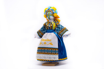 The Ukrainian motanka doll is an ancient amulet and symbol of Ukrainian culture, made without a face so as not to instill a soul in it. Instead of a face, a cross is often dangled to protect against e