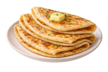Stack of crepes on a plate with butter