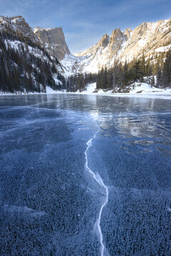 Frozen Dream Lake with Ice Cracks in Rocky Mountain National Park