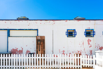 Facade of old building by the sea, exterior