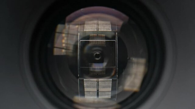 Macro Focus: Camera Lens and its Reflected World with Zoom Lens Transition Effect