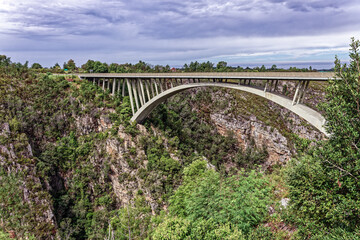 100 meter ( 328 feet) Paul Sauer decked arch bridge built in 1956 over 120 meter ( 400 feet) deep Storms River in the Tsitsikamma region of the Eastern Cape, South Africa