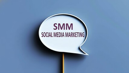 White speech bubble with purple text SMM Social Media Marketing on a simple blue background with soft shadow, concept for digital communication and advertising.