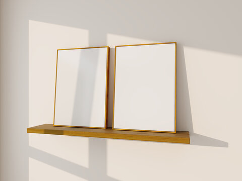 2 wooden frames mockup on wood shelf with white wall. Two empty posters mock-up, basic decor scene
