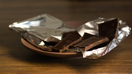 Dark chocolate  on the table, sweet dessert