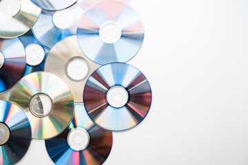 Layout of of CD and DVD discs on a white background top view.