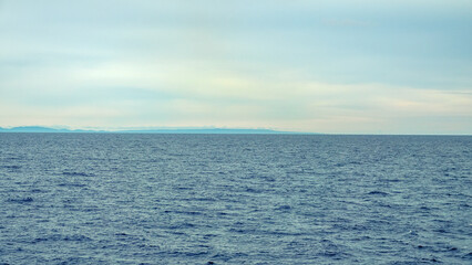 Obraz premium Tropical seas. Views of the Bali Sea from the ship in winter-summer in the southern hemisphere. Indonesia