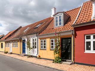 Row of colourful plastered terraced townhouses in old town Kerteminde, Funen, Southern Denmark © TasfotoNL