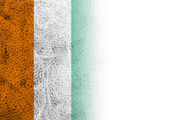 White background with Ivory Coast flag on fishing net