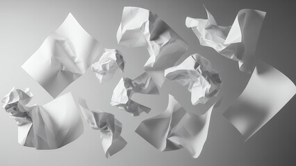 Crumpled paper sheets floating in mid-air, captured from a high viewpoint