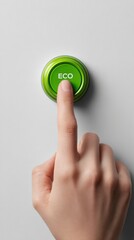 Eco button pressed by finger symbolizing green choices and sustainable action