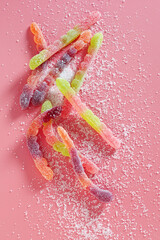 Sour gummy worms candy pile
