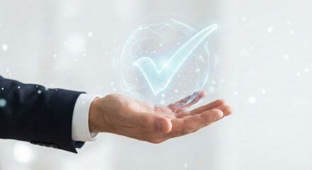 Businessman holding holographic checkmark over hand