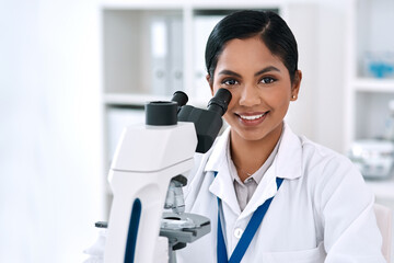 Scientist, microscope and portrait in lab for science, innovation and medical healthcare development. Woman, analysis and chemistry experiment for pharmaceutical breakthrough and vaccine research