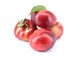 Fototapeta premium Flat nectarines, a peach variety, also known as rectangular nectarines, on white background. 
