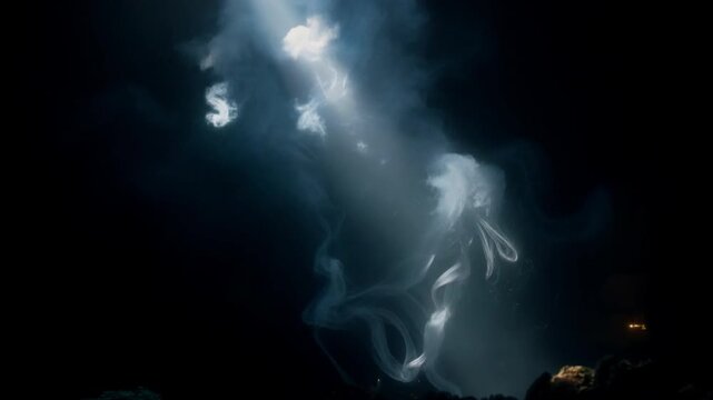 Mysterious Whispers in the Abyss: A hauntingly beautiful display of ethereal light dances through a smoky abyss, evoking a sense of enigma and otherworldliness.