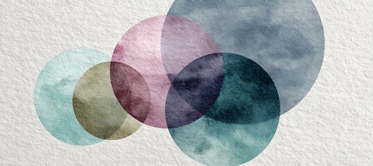 Abstract watercolor circles overlapping and blending together on textured background beautifully displayed