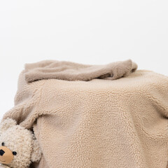 Brown towel with teddybear