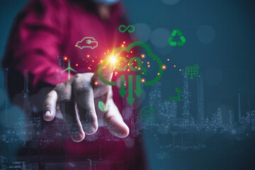 A hand of a man touching on cloud computing CO2, featuring symbols for recycling, renewable energy sources.