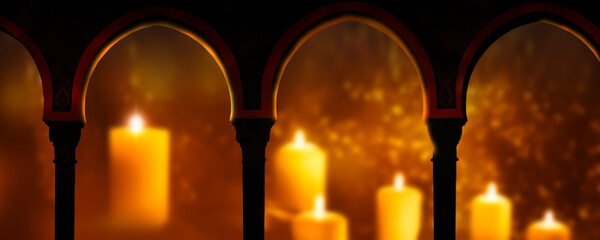 arches of a mosque with blurred burning candles in the background in the evening, festive backdrop for islam holidays, travel or vacations