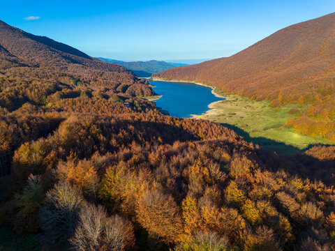 the blue Lake of Paduli is nestled along the Lagastrello road pass in Lunigiana