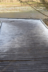 wooden bridge over lake