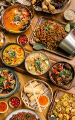 many different thai food dishes on table in modern restaurant in bangkok thailand