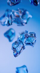 Cool Crystal Cubes: A close-up showcases translucent ice cubes, showcasing their icy texture against a cool blue backdrop. Evoking refreshment and chilled delight.