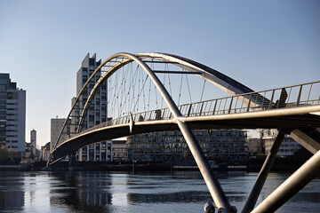 Fototapeta premium Pedestrian bridge over the Rhine between Weil am Rhein in Germany and Huningue in France