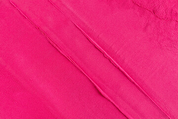 Bright stylish background of pink, crimson blush with straight characteristic lines. dry texture of a cosmetic product. copy space. Layout for design
