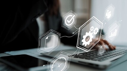 Modern Businesswoman Working on Laptop with Conceptual Digital Graphics Representing Data Analysis and Project Management in Contemporary Office Setting Gluon.