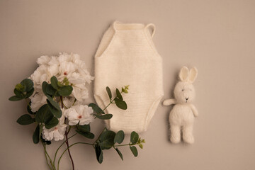 Newborn clothes with toys and flowers in a beautifully folded position for a photo © VideofotKA