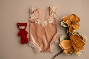 Newborn clothes with toys and flowers in a beautifully folded position for a photo © VideofotKA