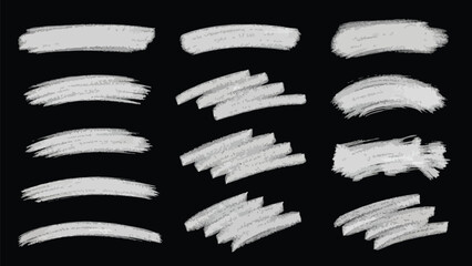 A striking collection of various white chalk and paint brush strokes, along with energetic scribbles on a dark black background, creating a bold, contrasting texture. © Fezi