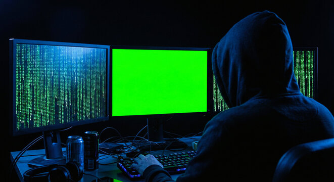 Hooded Man Looking Up at Digital Rain Matrix Code Background
