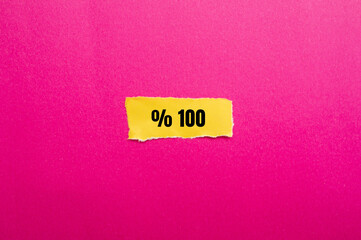 One hundred percent message written on ripped torn paper background. Conceptual One hundred percent symbol. Copy space.