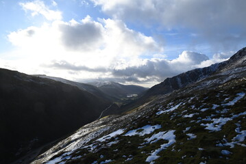 a view walking up a snowy Cadair Idris in south Gwynedd, wales from the mach loop