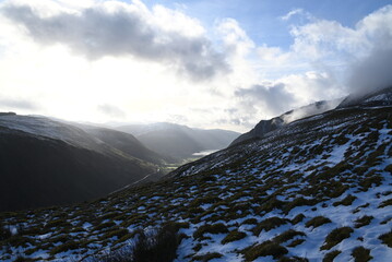 a view walking up a snowy Cadair Idris in south Gwynedd, wales from the mach loop