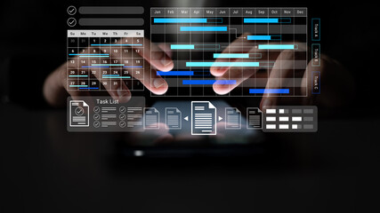 A business professional utilizes advanced digital tools on a tablet to manage project schedules and enhance productivity in a modern office setting. Gantry
