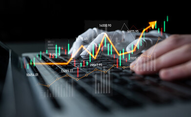 Dynamic scene showing hands on a laptop keyboard with financial graphs illustrating data analysis and investment strategies in a digital workspace environment. Scalp