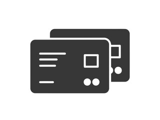 Two dark gray credit card icons on a for finance and banking concepts
