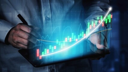 A person engages in data analysis on a tablet, showcasing vibrant financial graphs that indicate growth and positive market trends in a digital workspace. Copula
