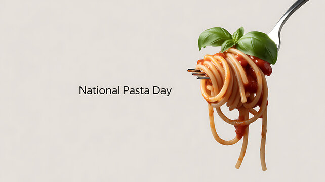 Spaghetti with tomato sauce and basil on a fork for National Pasta Day