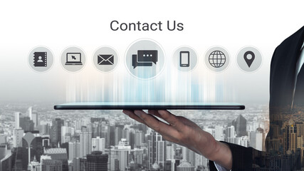 A sleek tablet displays various modern communication icons against a city skyline, highlighting business connectivity and digital interaction for effective outreach. Gantry