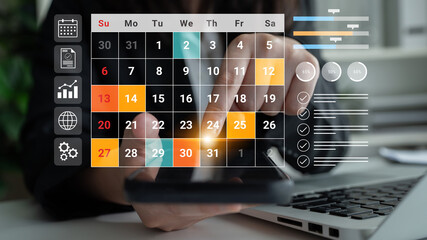 A close-up view of a smartphone displaying a vibrant digital calendar with dates highlighted, emphasizing planning and productivity in a modern office environment. Gantry