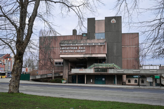Brutalist architecture of Swintons Lancastrian Hall and Central Library on an overcast day.