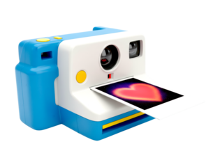 Modern blue and white instant camera with a yellow shutter button printing a romantic photograph of a glowing red heart, symbolizing love and affection