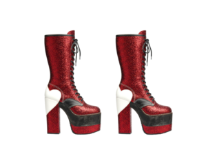 Pair of red glitter platform boots with high chunky heels, black laces, and a white heart detail, representing an extravagant glam rock or alternative fashion style