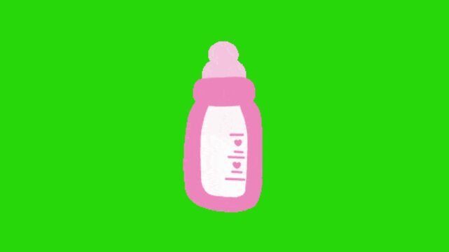 baby bottle on green background